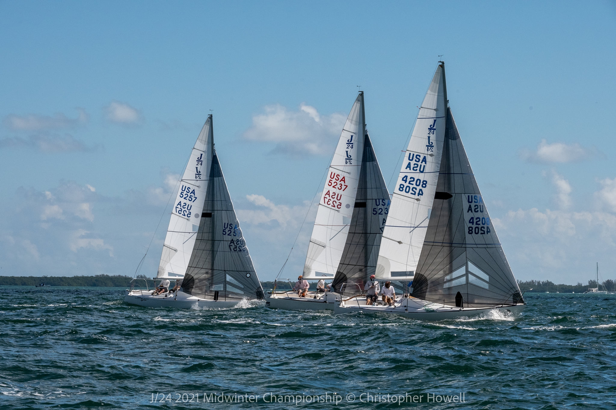  J/24  2021 Midwinter Championship  Miami FL  Day 1  Carter White on Wind Monkey first leader 